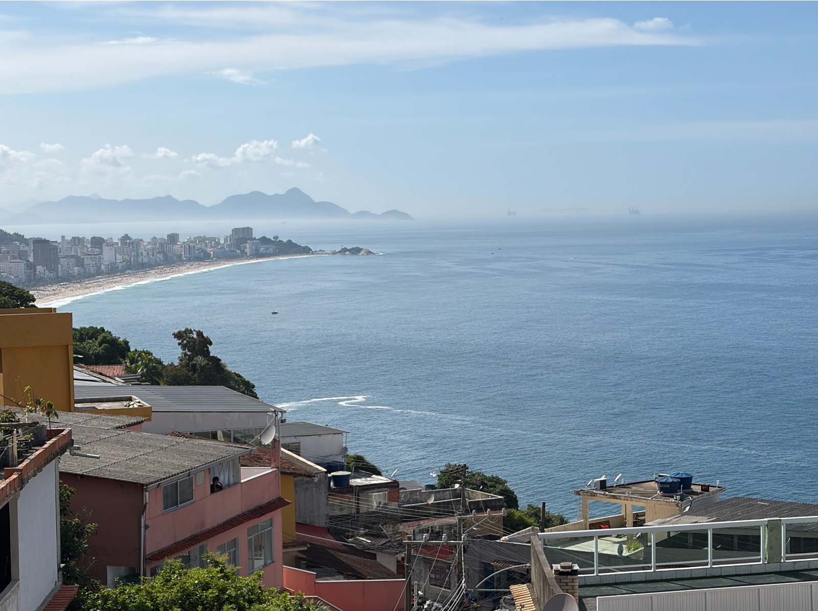 The view from Vidigal over the rooftops and the sea to the beaches of Leblon and Ipanema.